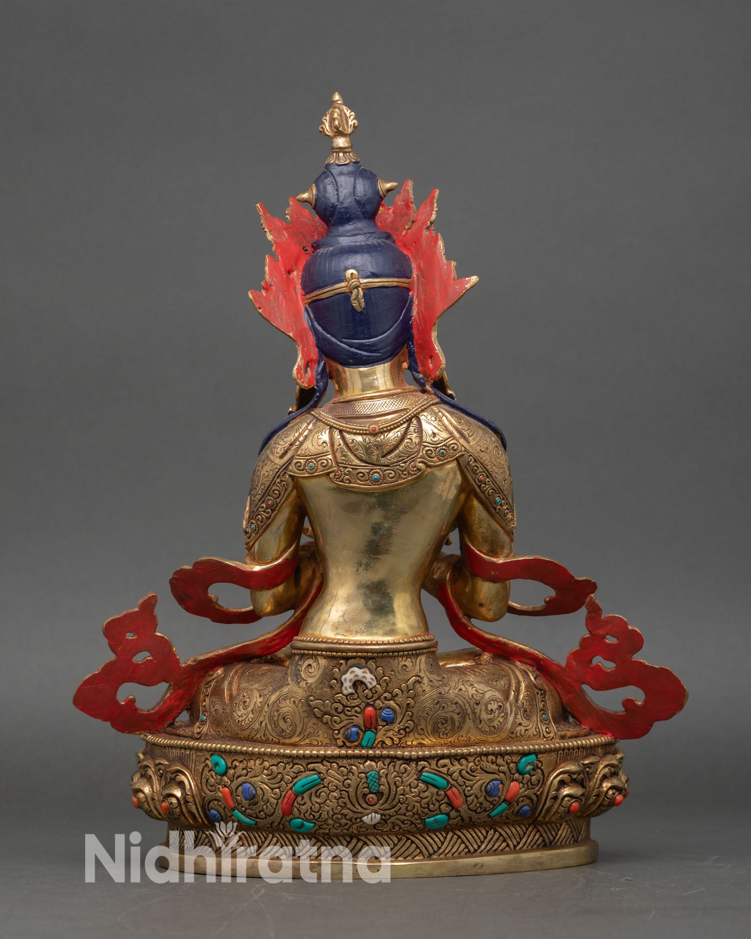 Back view of  Vajradhara statue, intricate lotus seat semi-precious stones detail