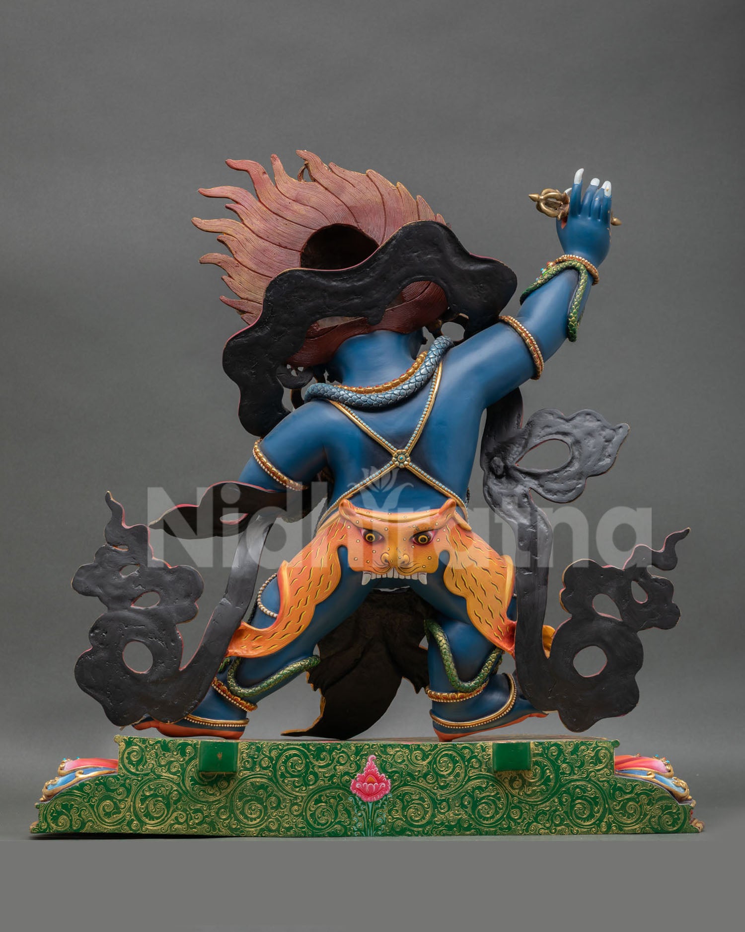 Back view of Vajrapani statue, Himalayan Buddhist protector deity copper sculpture, acrylic paint, intricate detailing, meditation altar, sacred decor