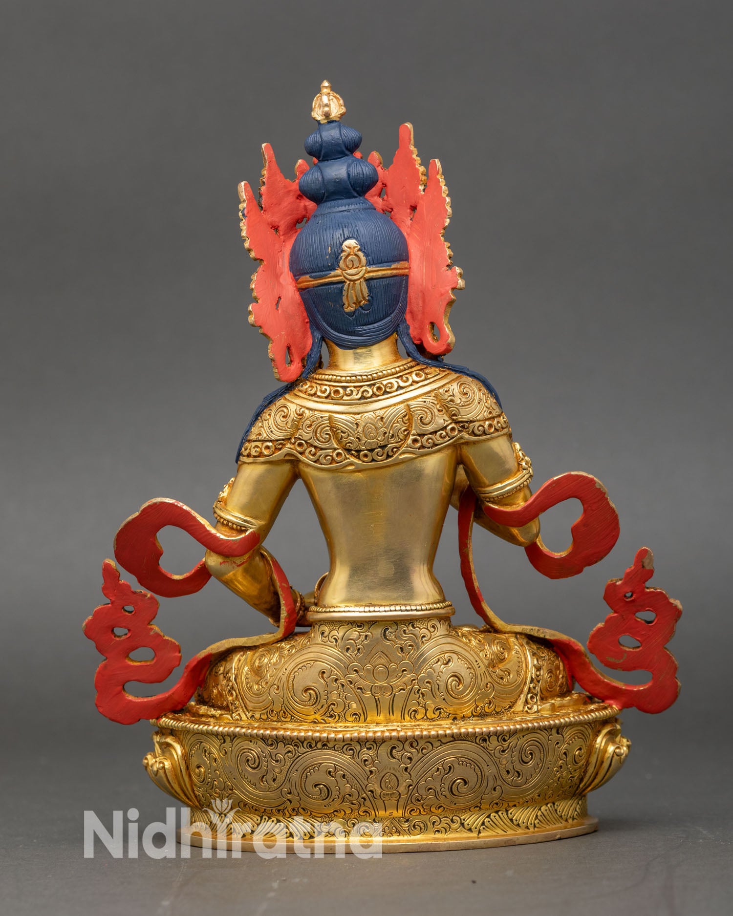 Back view of Vajrasattva statue detailed lotus pedestal copper gold craftsmanship