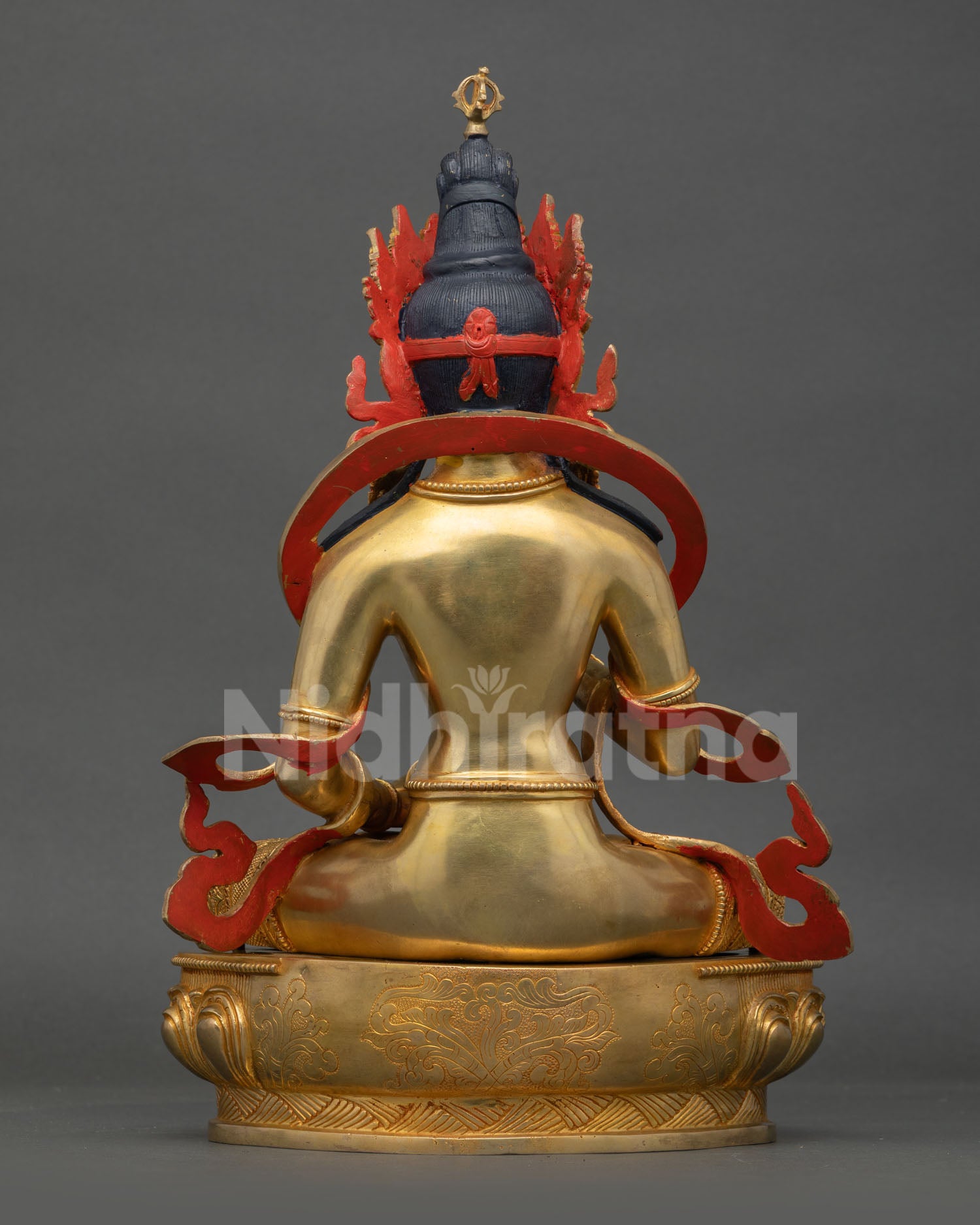 Back view of Vajrasattva Statue Nepal handmade gold gilded copper sacred Buddhist deity artwork detailed Himalayan craftsmanship