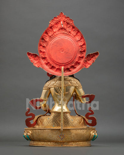 Back view of Vajrasattva statue traditional Newari lost wax copper sculpture with ornate robes gold finish and sacred altar art design