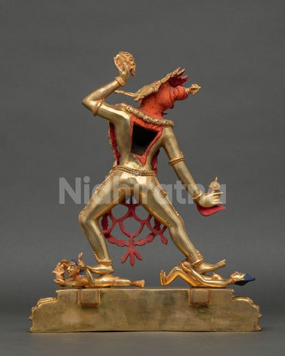 Back view of Vajrayogini Buddhist statue with ornate copper detailing flaming halo design and lost wax Himalayan metal artistry