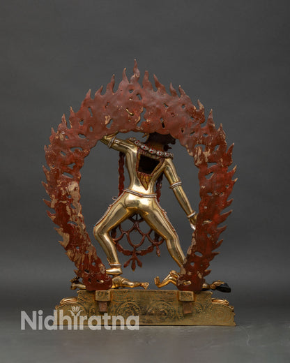 Back view of Vajrayogini statue, showing flame aureole, detailed jewelry, and sculpting
