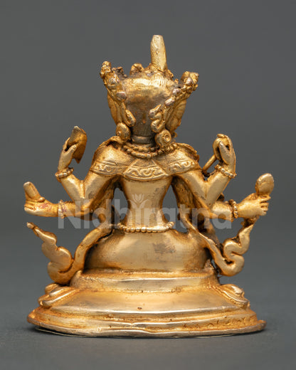 Back view of Vasudhara statue lotus throne gold gilded Nepalese Buddhist art sacred prosperity and wisdom altar sculpture