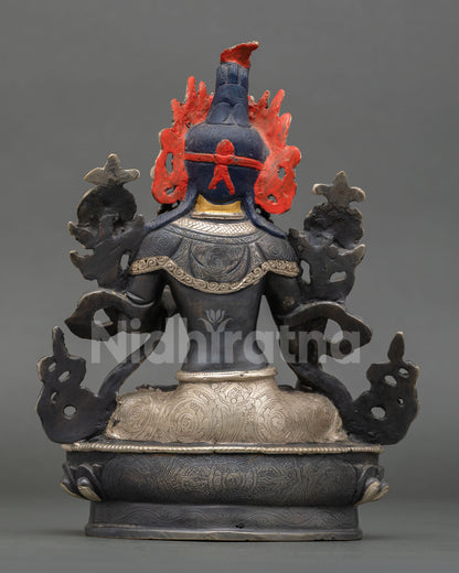 Back view of White Tara Buddhist statue, craftsmanship from Patan Nepal, highlighting traditional Himalayan artistry.