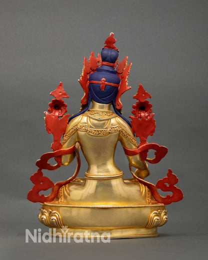 Back view of White Tara sculpture with detailed copper carving and traditional Himalayan artisan work