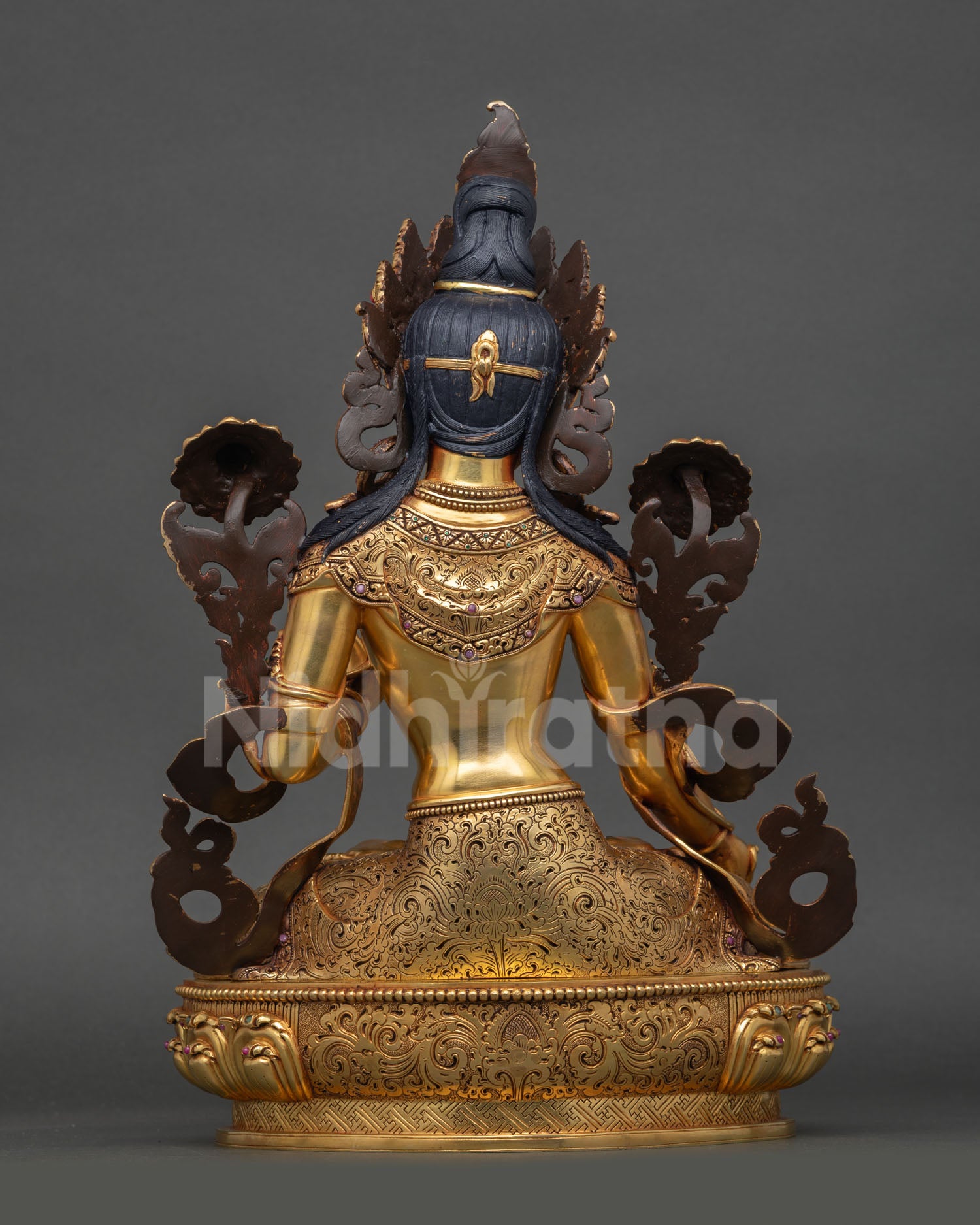 back view white tara statue ornate lotus pedestal intricate carvings nepalese sacred art