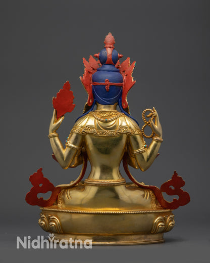 back view Four-Armed Chenrezig statue showing carved garments and copper base