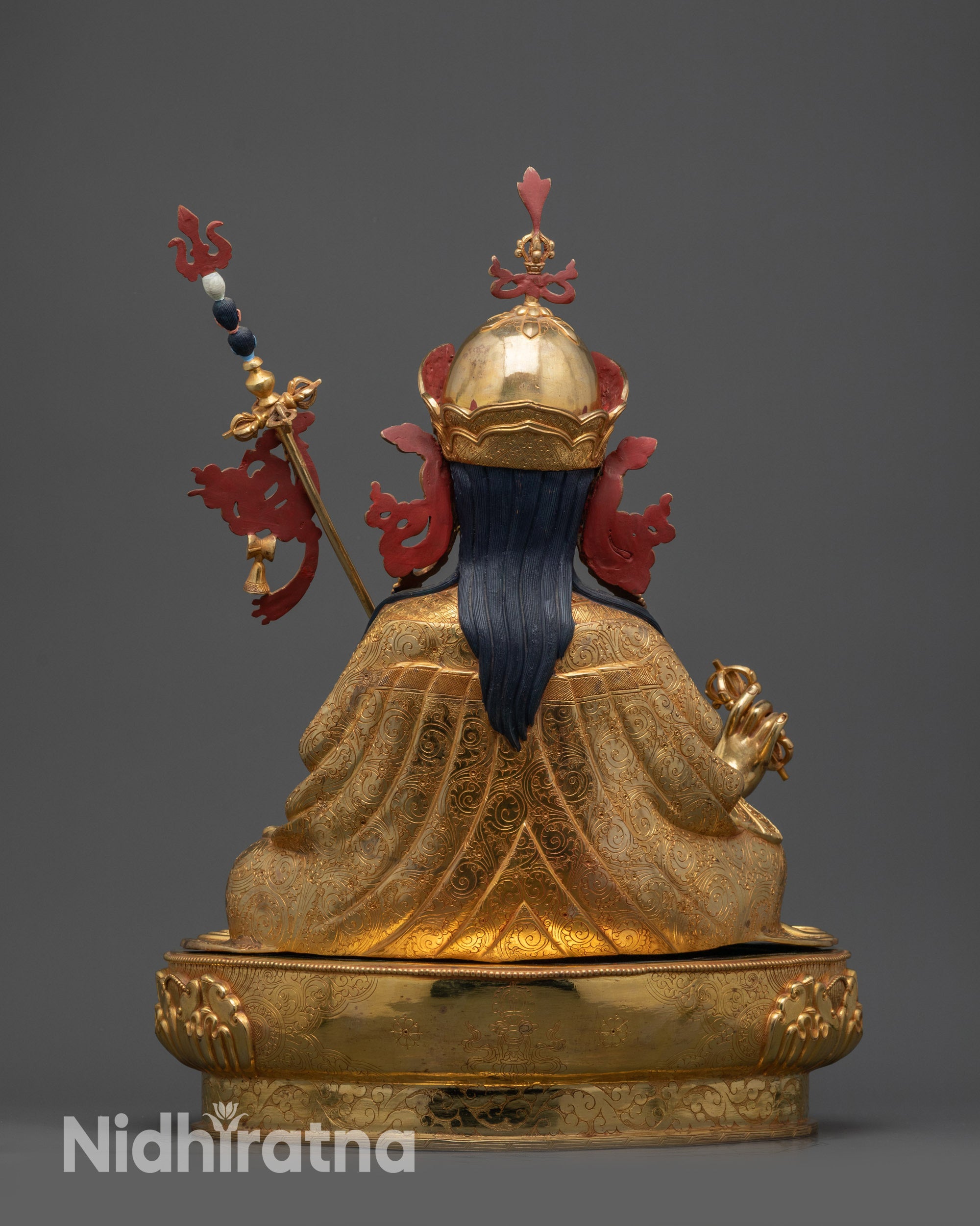 back view Guru Rinpoche statue showing carved vishwa vajra symbol on lotus seat base