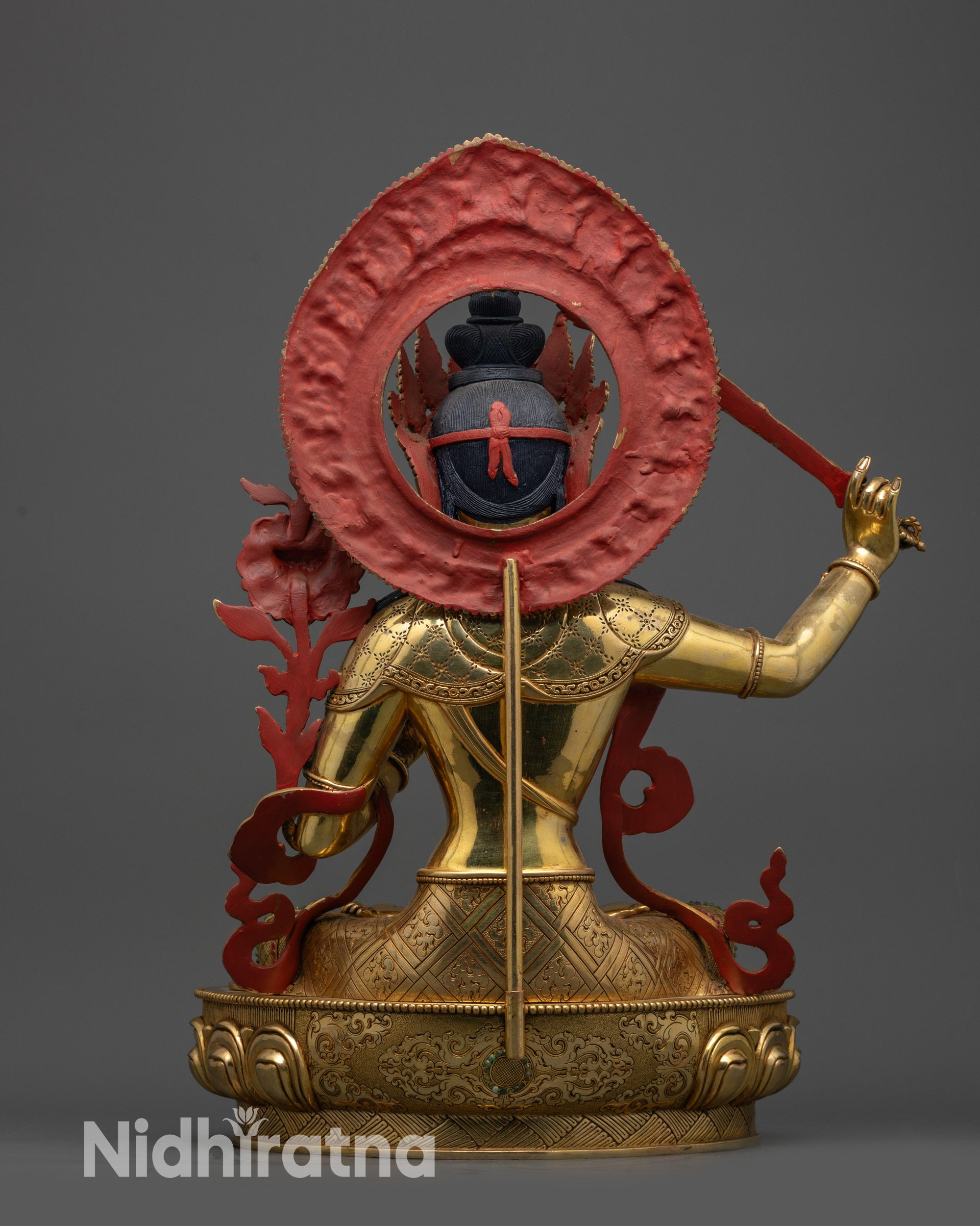 back view Manjushri Statue showing carved halo, robe patterns and lotus seat details