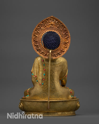 back view Seated Shakyamuni Buddha statue showing detailed robe and garment carvings