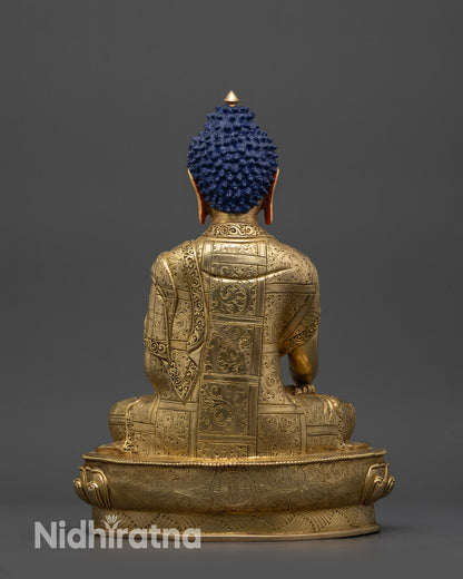 back view Shakyamuni Buddha statue with detailed robe carvings and lotus base