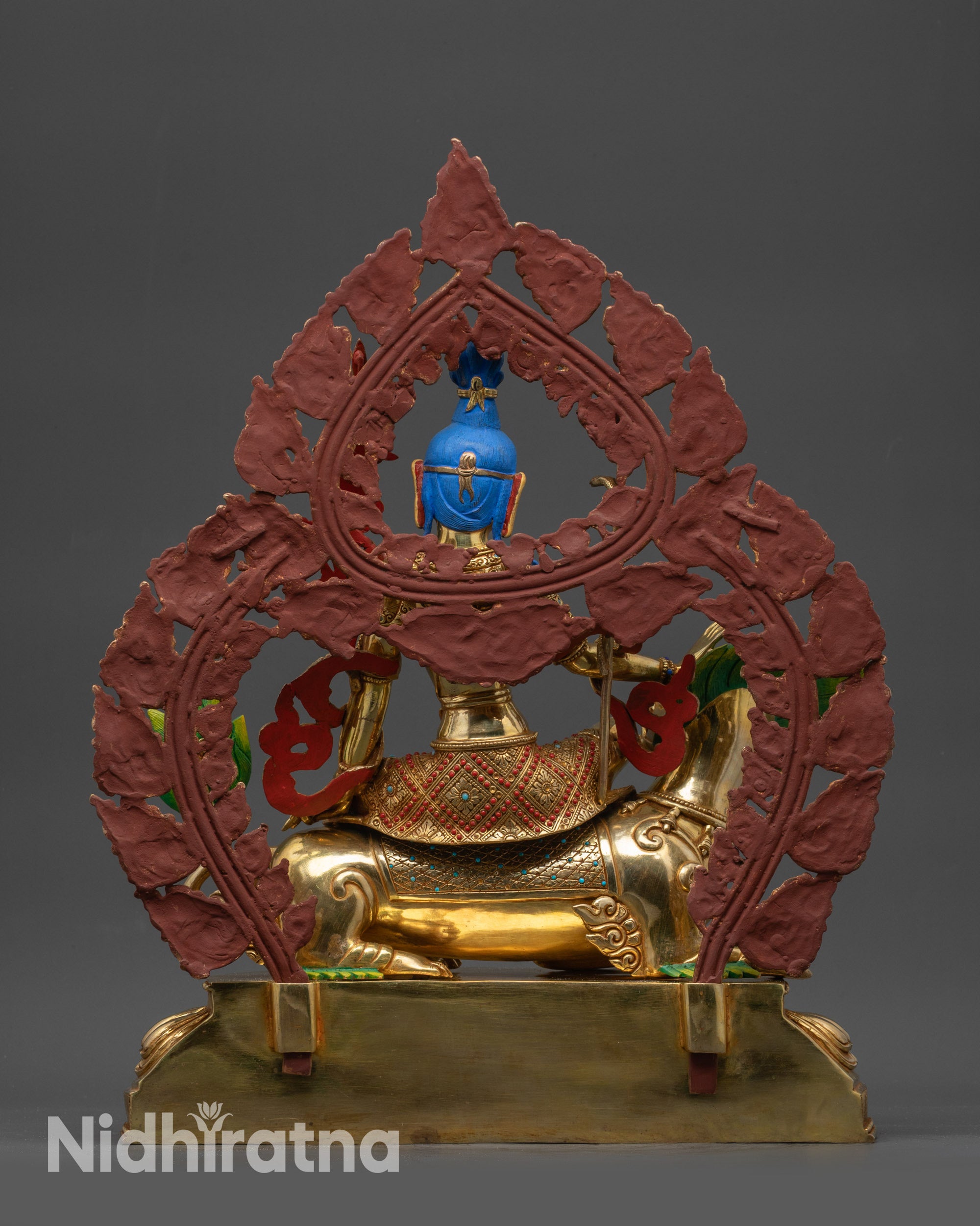back view Simhanada Avalokiteshvara statue with halo adorned with semi-precious stones
