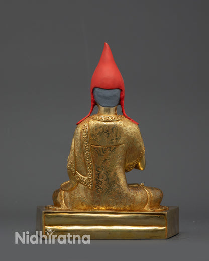 back view Trisong Detsen statue with crown flowing robes dharma wheel and utpala flowers