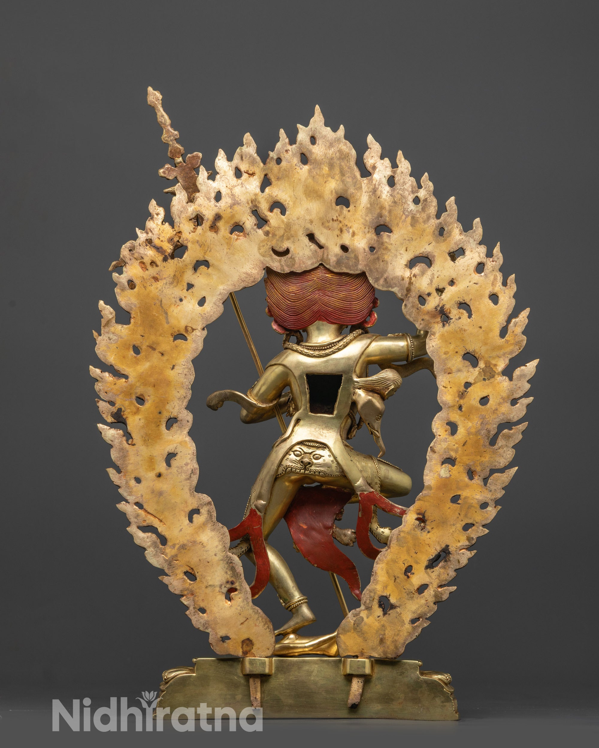 back view Troma Nagmo statue with blazing halo and intricate handcrafted design