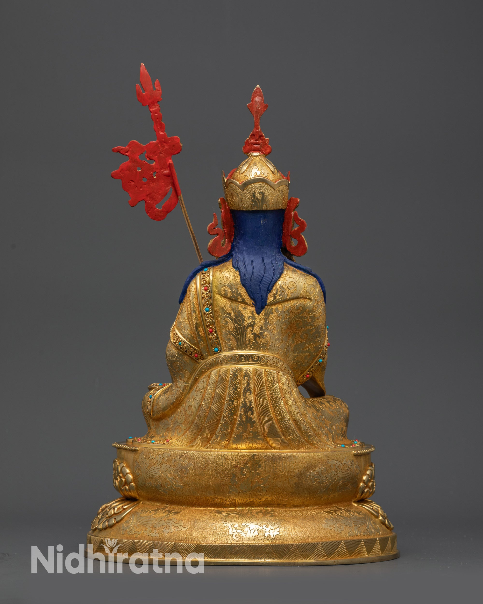 back view Tsokye Dorje sculpture showing robe folds and detailed lotus throne carving
