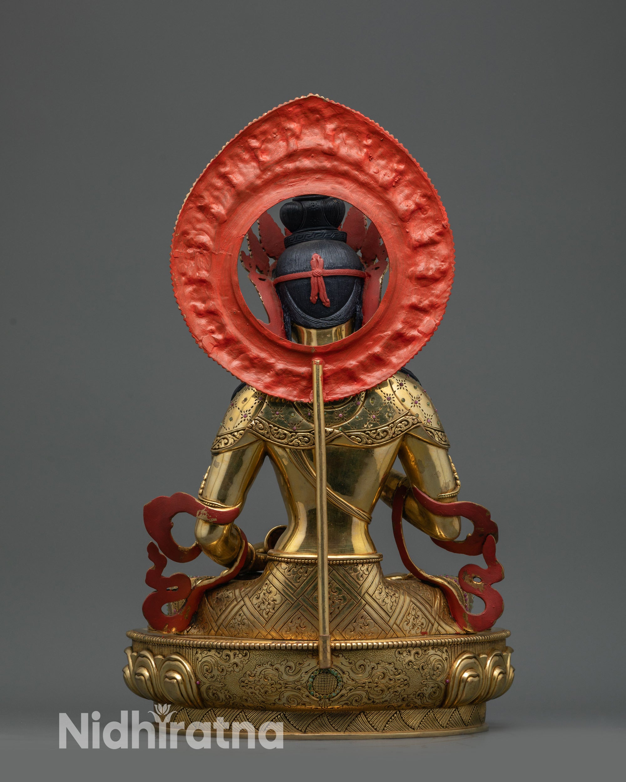 back view Vajrasattva statue showing detailed robe carving and lotus throne design