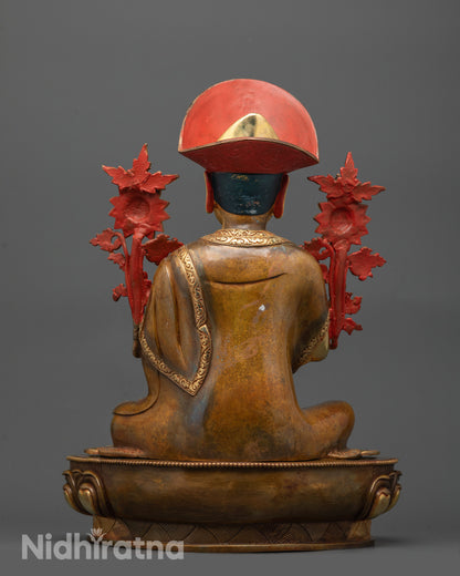 back view highlighting robe details and fire-gilded body of Nyamme Sherab Gyaltsen Statue