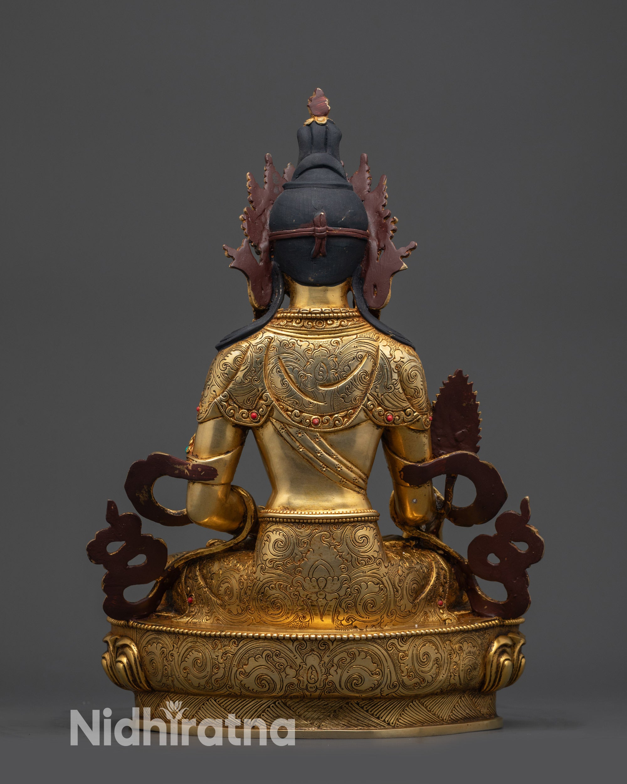 back view kshitigarbha statue robe patterns and lotus pedestal details