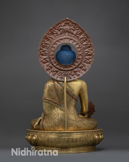 back view of Medicine Buddha Statue showing engraved Bhaisajyaguru mantra on lotus base