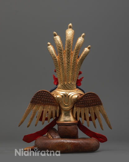 back view of Naga Kanya statue featuring delicately carved wings and intricate serpent details
