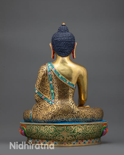 back view of Shakyamuni Buddha Statue showing intricate robe and lotus details