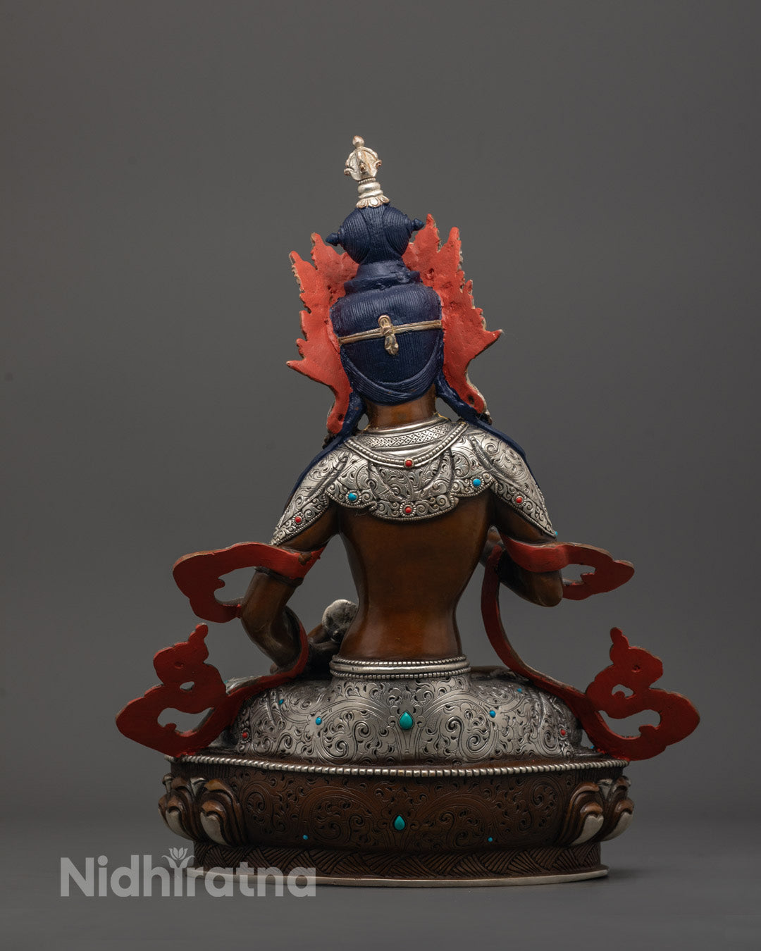 back view of Vajrasattva Statue showing oxidized copper finish and intricate robe carvings









