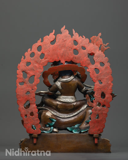back view of namtoshe statue featuring silver-plated halo and painted snow lion seat