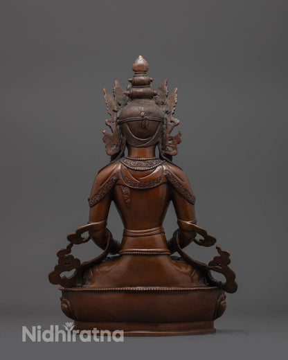 back view of oxidized Amitayus Buddha statue with intricate robe and base detailin