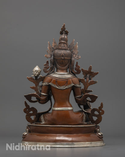 back view of oxidized copper green tara statue highlighting handcrafted lost wax detailing