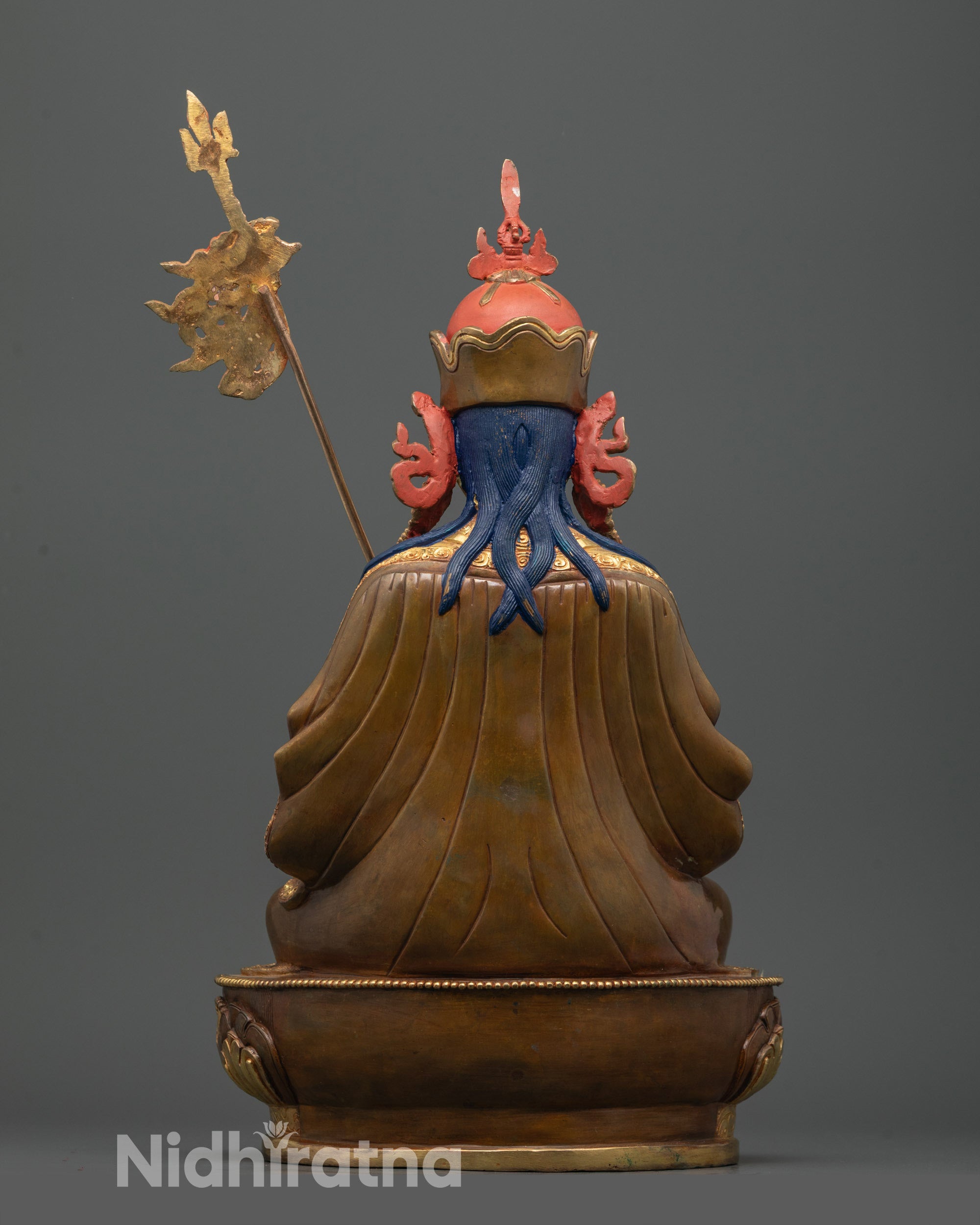 back view of tsokye dorje statue on partially gold gilded lotus seat with fine details