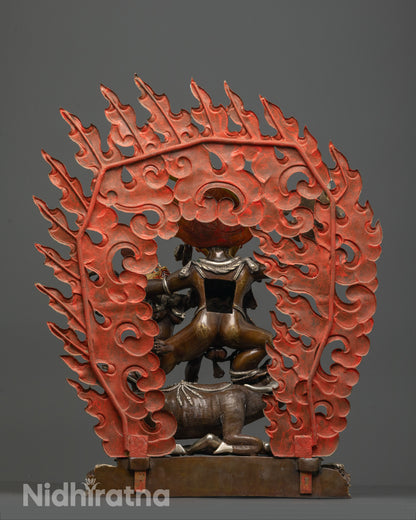 back view of yamantaka consort statue highlighting intricate halo and aged copper finish