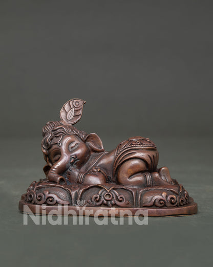 Bal Ganesh statue, handcrafted by Newari artisans in Patan, Nepal with an oxidized copper finish