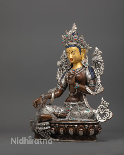 base view of Green Tara Statue showcasing detailed lotus petals and oxidized copper finish