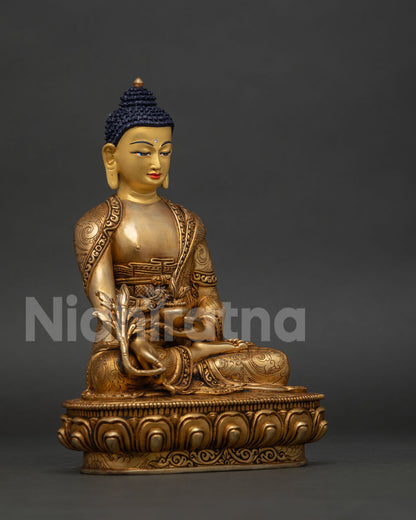 Bhaisajyaguru Buddha statue from Nepal with hand chiseled floral motifs and healing vessel.