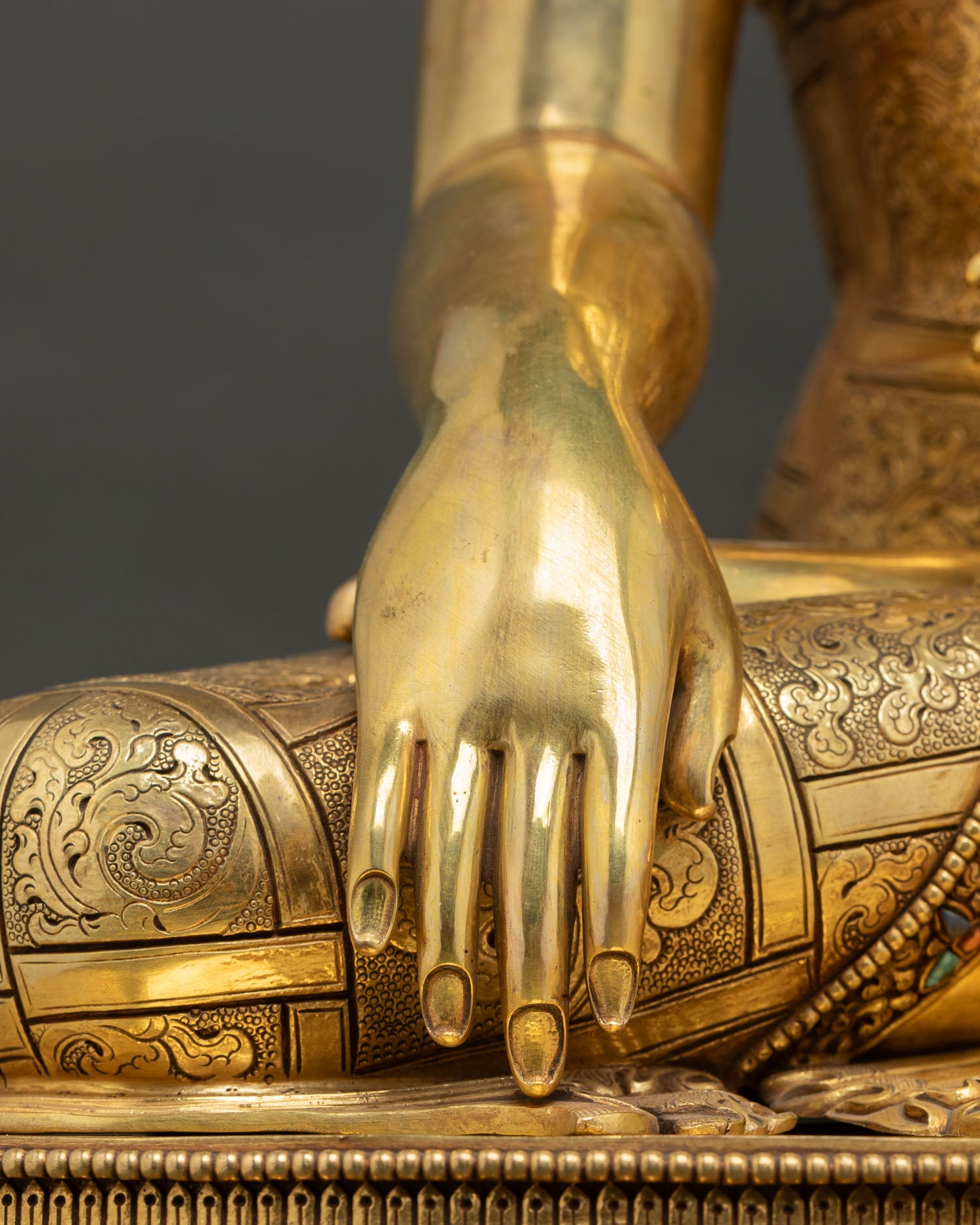 bhumisparsha mudra hand detail of shakyamuni buddha statue on lotus seat