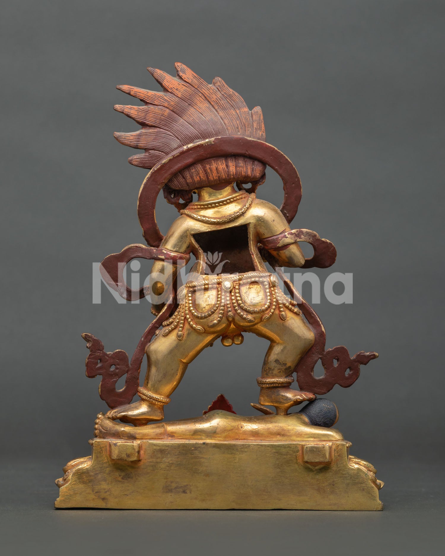 Black Dzambhala Buddhist sculpture representing protection, abundance, and spiritual transformation