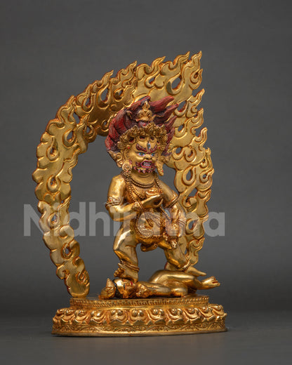 Black dzambhala copper statue with semi precious stones and ornate lotus base.