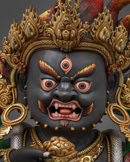 Black Dzambhala face close-up – wrathful expression, third eye detail