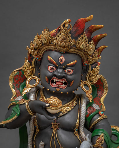 Black Dzambhala Statue close-up – handcrafted copper wealth deity