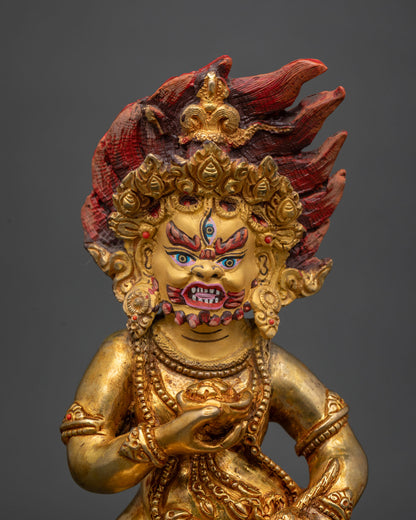 Black dzambhala statue gold fire gilded copper with 24k gold painted face.