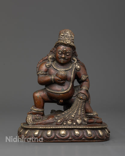 Black Dzambhala statue handcrafted by Newari artisans from Nepal.