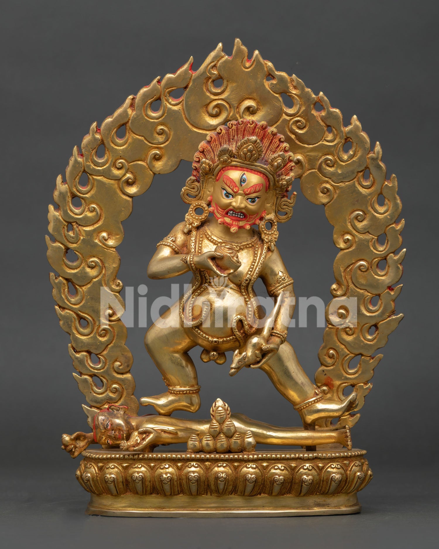 Black Dzambhala statue, handcrafted in Nepal with gold details and gold painted face