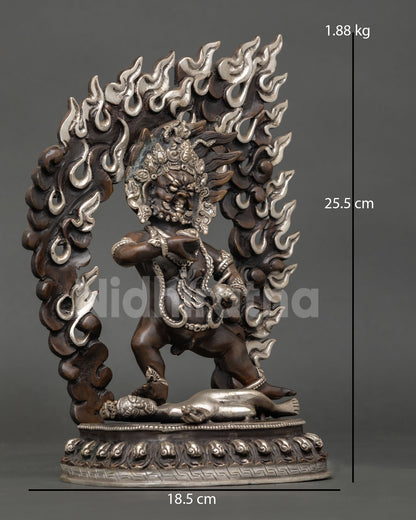 Black Dzambhala Statue right side view, flaming halo detail, oxidized copper, Tibetan deity Nepal