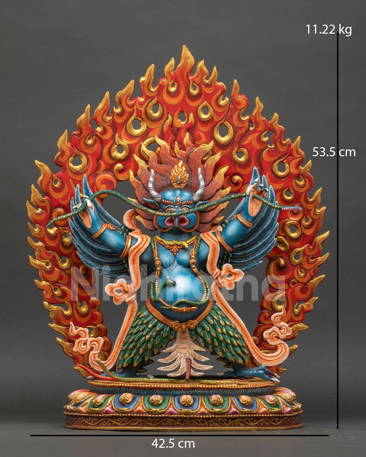 Blue Garuda statue front view with flaming halo and outstretched wings