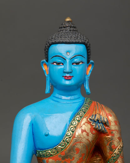 blue shakyamuni buddha statue close up, acrylic painted buddhist sculpture from nepal