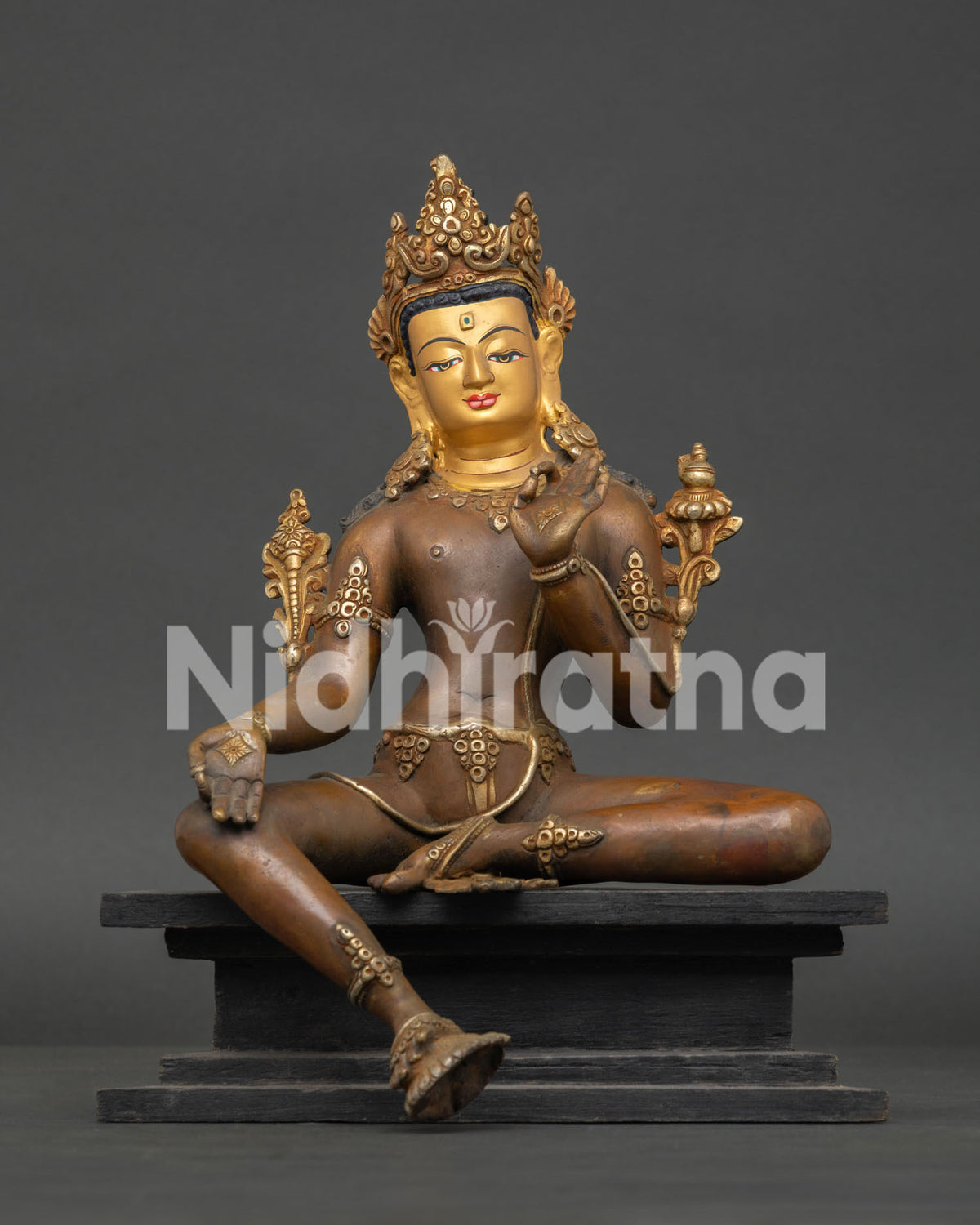 Bodhisattva Statue from Nepal with 24K gold details and wooden throne base