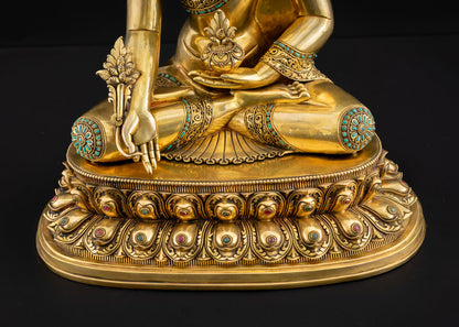Bottom view of Medicine Buddha ornate gilded lotus pedestal with detailed petal carvings, Nepal statue