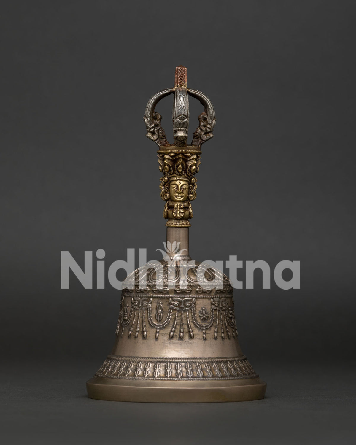 Bronze Buddhist Bell Ghanta with intricate sacred carvings