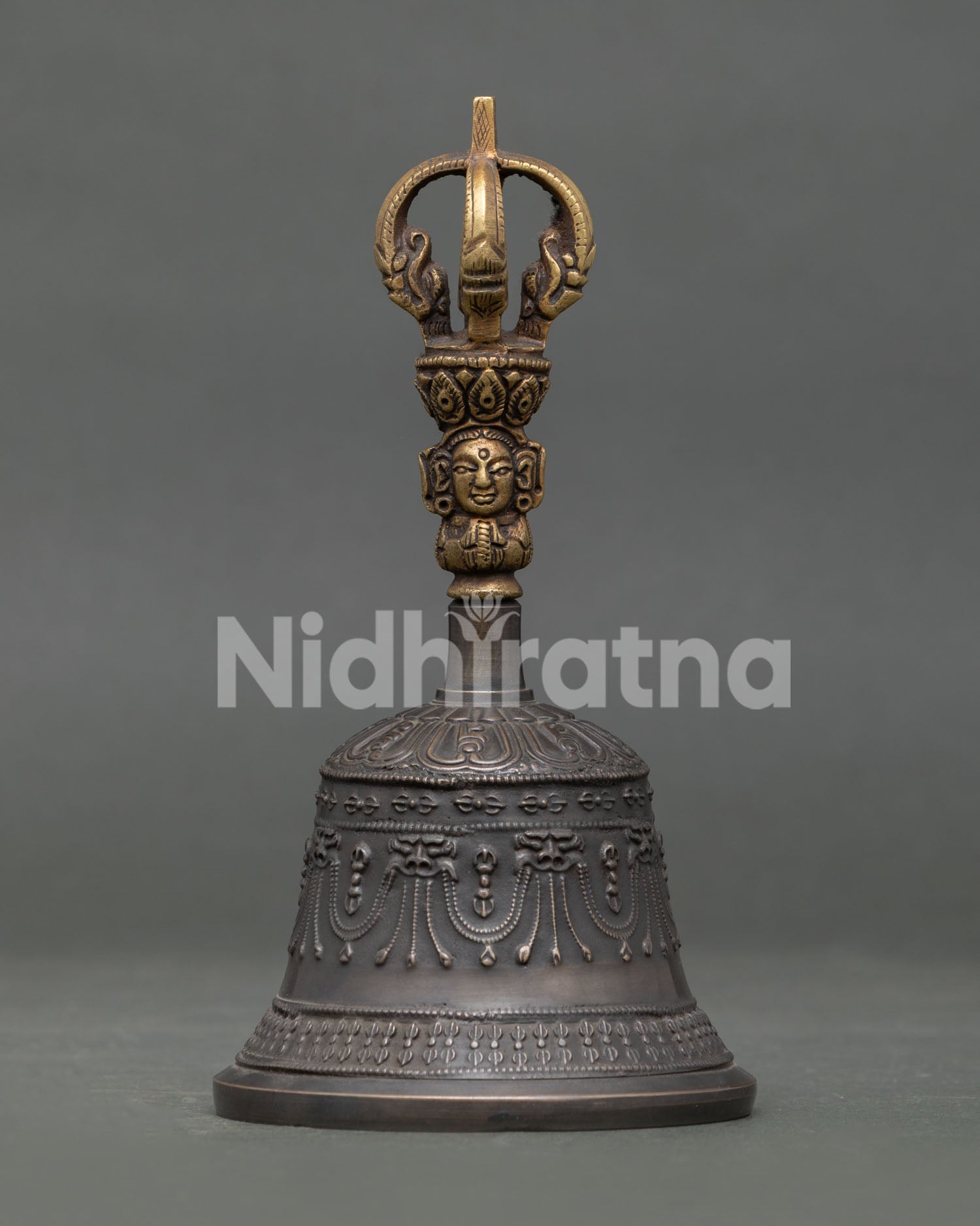 Bronze Buddhist Bell with Carved Brass Deity Handle